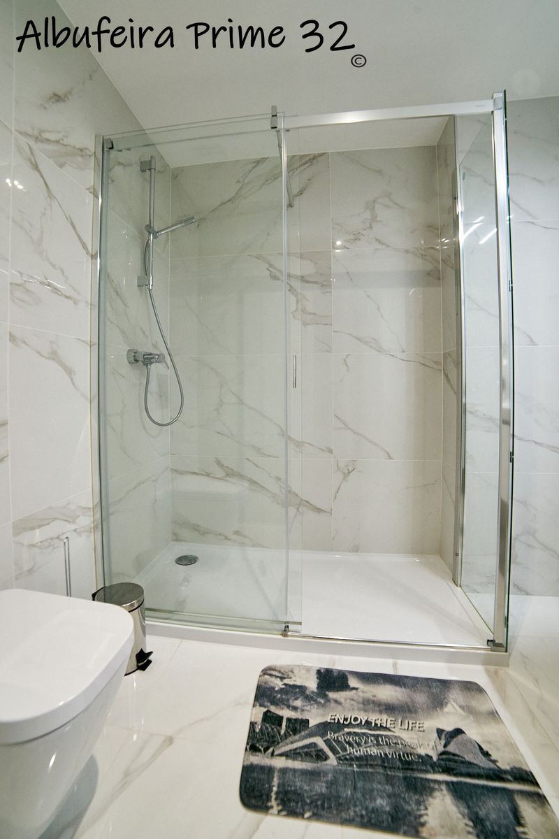 Second bathroom with a large walk-in shower