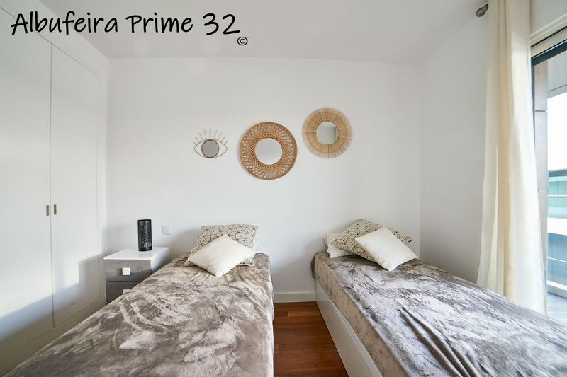 Second bedroom with two single beds
